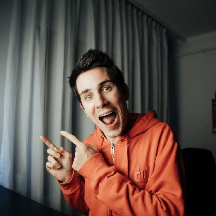 Kaveri Mehta, Lead Design Curator at FrameHavenStudio, reviewing corporate floral arrangements